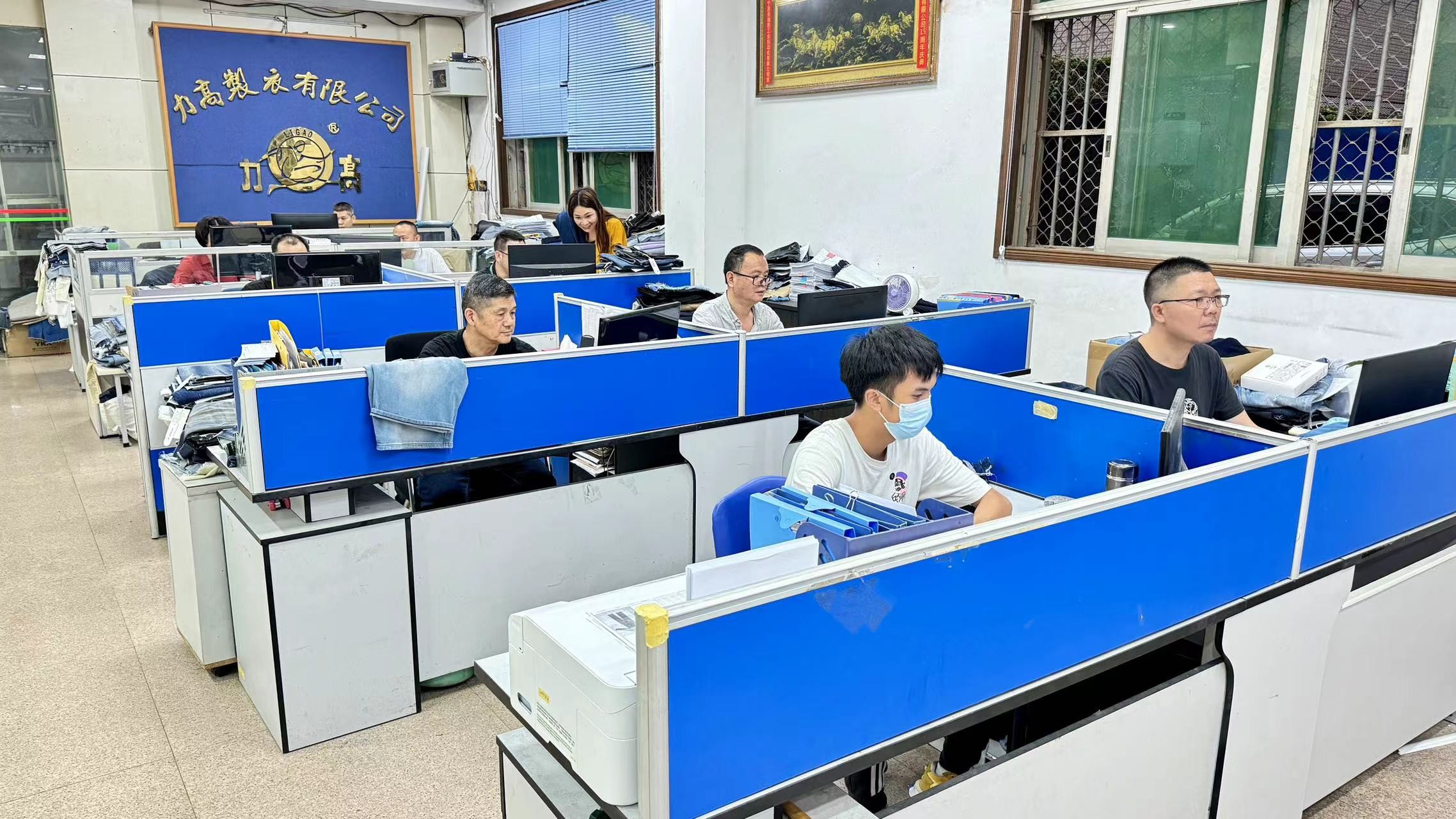 Guangdong Shunde Leka Clothing Design Co., Ltd línea de producción de fábrica