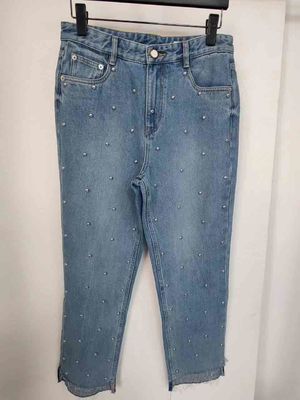 Estrella como pernos en las piernas Denim Bajo para un aspecto único, sobresaliente