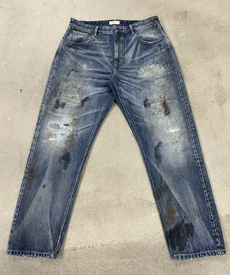 Estilo Vintage Hombres Jeans de lavado pesado para una mirada clásica angustiada