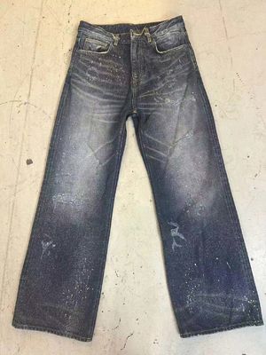 Vintage inspirado en el diseño de la pintura Splatter Denim Bottom para un aspecto audaz y de punta