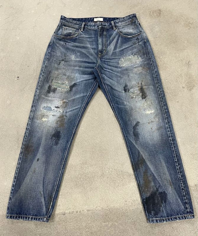Estilo Vintage Hombres Jeans de lavado pesado para una mirada clásica angustiada